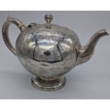 A Victorian Scottish silver bullet teapot, repousse embossed, ivory banded handle, hallmarked
