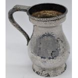 A Scottish Arts and Crafts silver miniature tankard, planished finish, hallmarked Edinburgh, 1907,