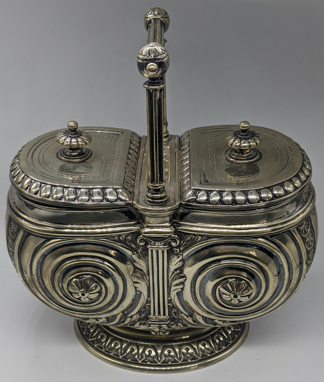 A Victorian silver plated biscuit box, twin lids and elaborate fluted handle, H.23cm