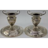A pair of of Wedgwood sterling silver candlestick in the Neoclassical design, H.13.5cm D.14cm