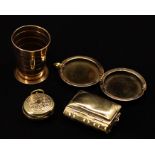 A brass collapsable travel stirrup cup, a brass sovereign case in a pocket case, together with