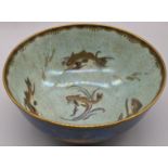 A Wedgwood lustre bowl by Daisy Makeig-Jones, mottled blue exterior with gilt fish, shells and