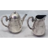 Fratelli Broggi, Milano, an unusual Italian silver plated teapot and water jug, banded handles and
