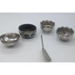 Four Eastern silver bowls and stirrer, 105g