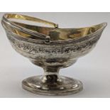 A George III silver sugar basket by George Burrows, gilt interior, vacant cartouches, swing