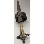 A 19th century Ethiopian dagger with leather scabbard, L. 42cm