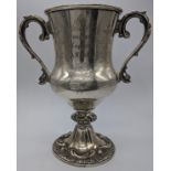 A twin handled silver cup by Cooke & Kelvey of Calcutta, inscribed Won by Captain A.Litster and 1876
