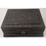 A late 19th century Indian Colonial finely carved ebonised correspondence box, label to verso, H.6.