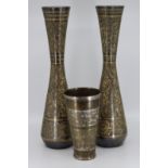 Pair of Middle Eastern vases with one other beaker