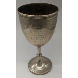 A Victorian silver goblet, hallmarked London, 1870, maker Robert Harper, engraving to both sides,