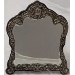 An Edwardian silver framed mirror, original bevelled plate glass, hallmarked Chester, 1901, H.36cm