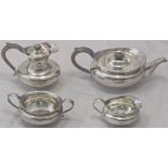 A silver four piece tea set, hallmarked Sheffield, 1926, maker Thomas Bradbury & Sons Ltd, 2142g