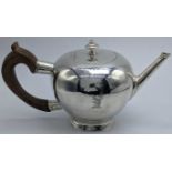 A George I silver bullet teapot by Timothy Ley, hallmarked London, 1726, stag head crest, 391g, H.