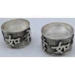 A pair of Chinese silver napkin rings, character marks and vacant cartouche, marks to the inside
