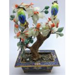 An early 20th century Chinese jade and coral tree, cloisonne enamel birds and pot, H.17cm