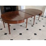 A late Georgian mahogany dining table, two separate D-end tables with two central inserts, square