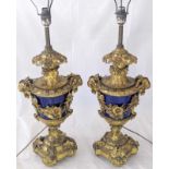 A pair of French ormolu mounted cobalt blue porcelain vases, late 19th century, converted to