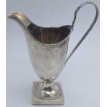 A George III silver cream jug, hallmarked London, 1781, maker Joshua Jackson, filled base, 150g, H.