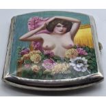 A South American Alpacca cigarette case with enamelled nude scene, 146g, H.9cm W.8cm