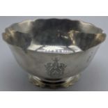 A Continental silver bowl, waved edge, crest to front, marks to base, 205g, H.6.5cm D.14.5cm