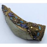 A 19th century Chinese gilded silver filigree fingernail guard, mounted with cloisonne enamel floral