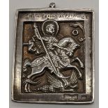 A late 19th century Russian silver icon depicting St.George slaying a dragon, marks to lower