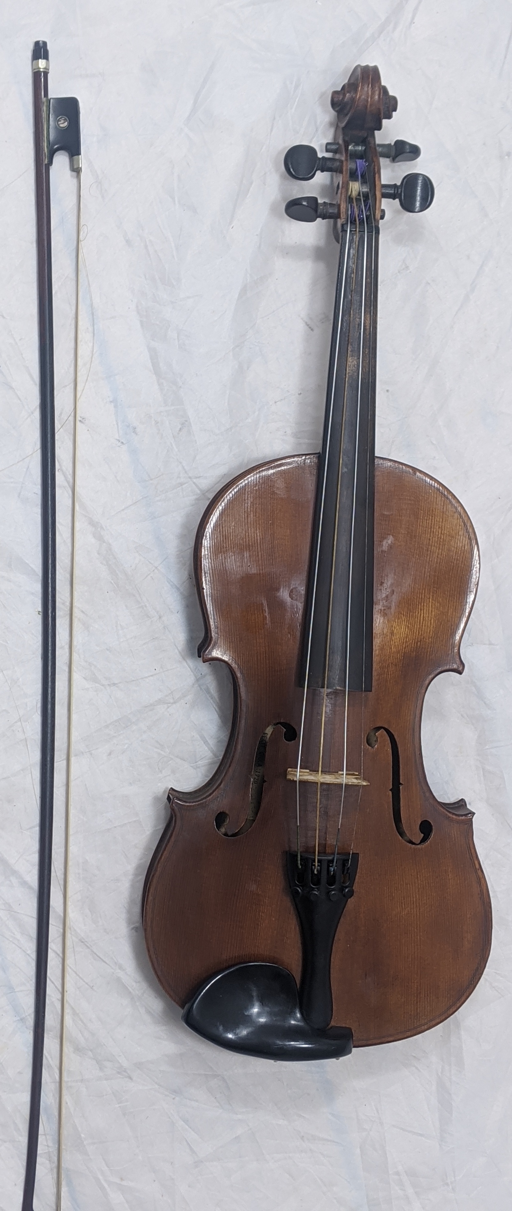 A violin bearing label -Japanese copy of Stradivarius model fecit circa 1720-, full size, together