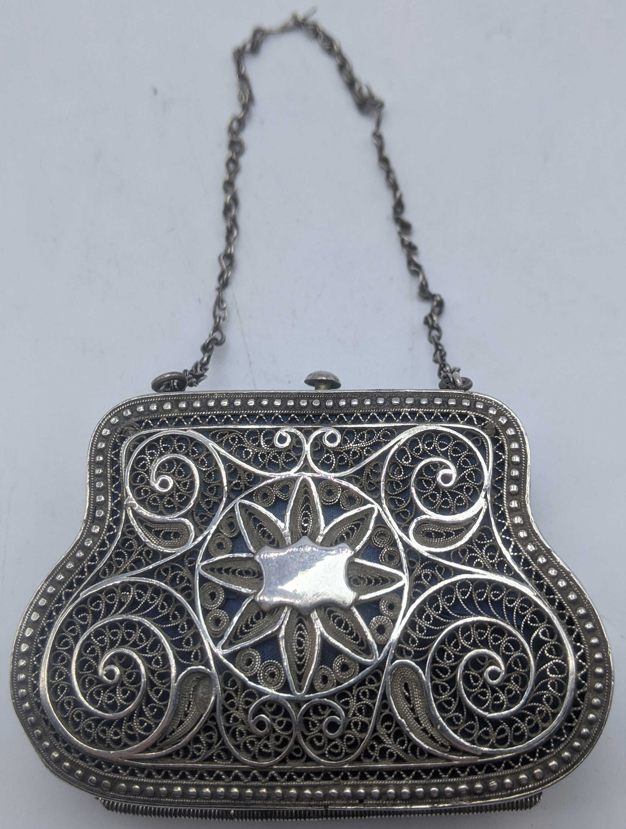 A late 19th century Russian filigree silver purse, H.5cm W.6.5cm