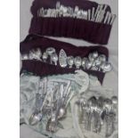A collection of silver plated flatware and cutlery