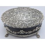 An early 20th century silver and tortoiseshell box, the lid depicting a figural bucolic scene