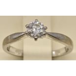 An 18ct white gold single diamond engagement ring, approx. 0.33cts, together with paperwork and
