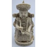 A late 19th/early 20th century Chinese carving of an emperor enthroned, character marks to base, H.