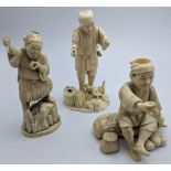 Three late 19th century Japanese ivory figures of fishermen, H.15cm (largest) (A/F) Buyer Note:
