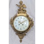 A Louis XVI style ormolu cartel clock, cherub finial, 8 day movement