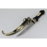 An early 20th Century Moroccan Koummya dagger with bone and horn panelled decoration, the grip