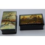 Two Russian wooden boxes with painted lid, signed, H.6cm W.9.5cm L.16cm and H.6cm W.10cm L.17cm