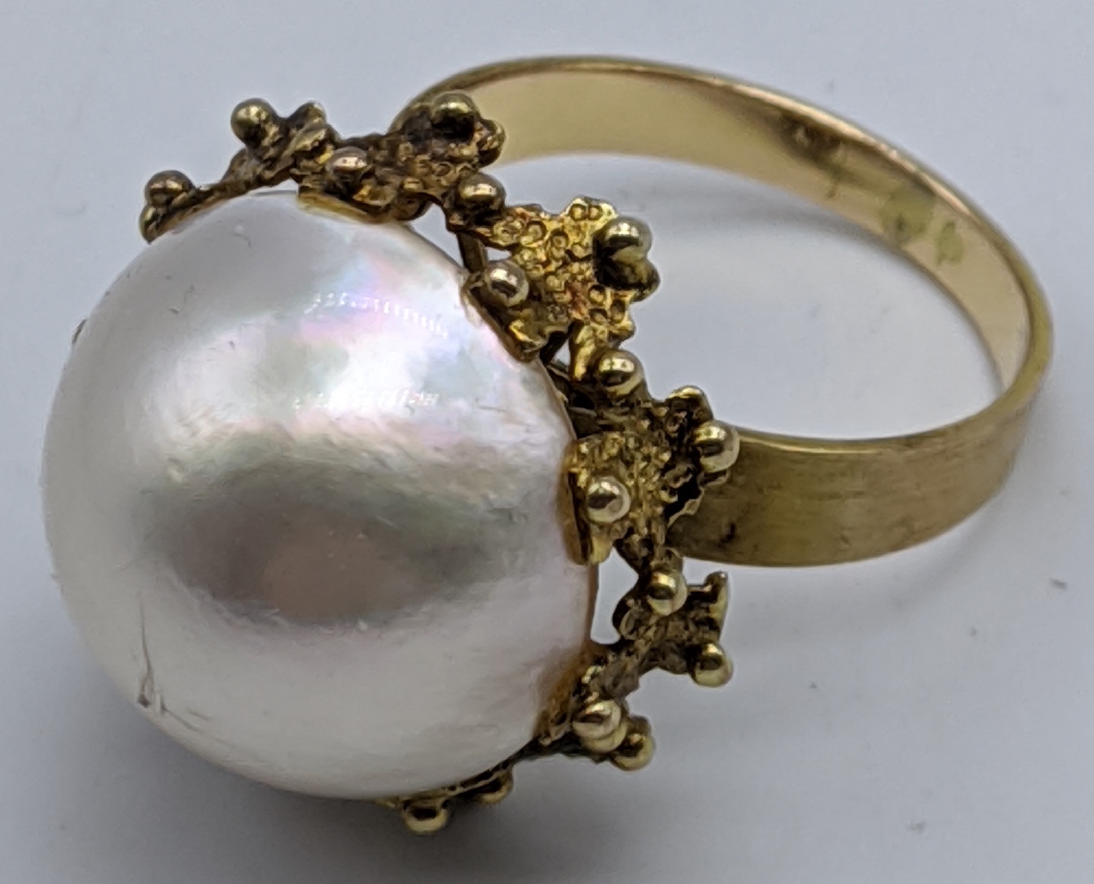 A 14ct gold and pearl ring, 7g, size P ½