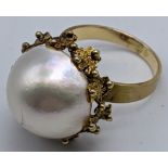 A 14ct gold and pearl ring, 7g, size P ½