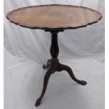 A Georgian mahogany tilt top table, bird cage mechanism, pie crust edge, claw and ball feet, H.