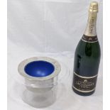 A Champagne display bottle H.50cm together with a bottle cooler in the form of a top hat