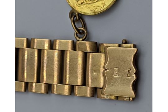 An 18ct yellow gold bracelet mounted with two half sovereigns, 53g, L.20cm W.1.5cm - Image 3 of 3