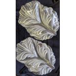 A pair of French leaf glass dishes