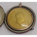 A Russian Alexander I yellow metal medallion within rose gold mounted and red leather case, D.5cm