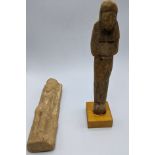 An Egyptian wooden shabti, New Kingdom, Ramesside Period, circa 1295-1070 B.C., H.20.5cm together