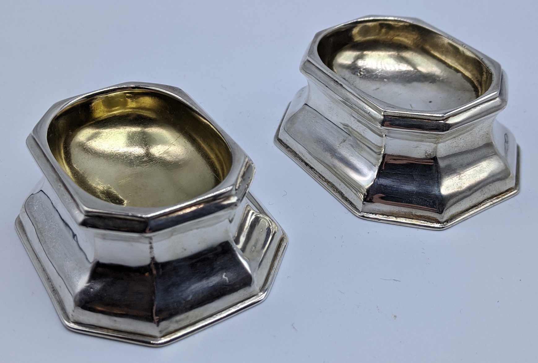 A pair of early Georgian silver salts, hallmarked London, indistinct marks, 91g, monogrammed to