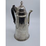 A Queen Anne silver coffee pot by Andrew Raven, crest to front, hallmarked London, 1704-05, 900g,