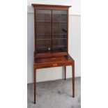 A Sheraton mahogany glass-front bookcase with shell and urn parquetry inlay, H.174cm W.62cm D.37cm