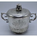 An early Georgian silver twin handled cup with cover, leaf design, crest -Semper Appratus-,