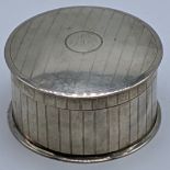 A late 19th century Chinese silver box, marks to base, maker Tok Sang, 180g, H.4.5cm D.8.5cm