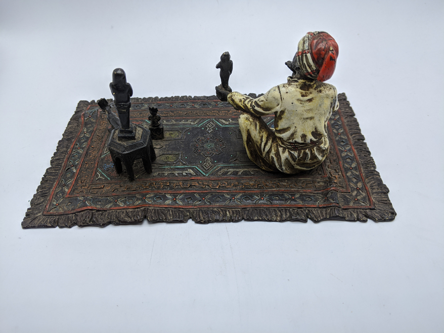 Franz Bergman, study of an Arab on a carpet selling Shabti's, Austrian cold painted bronze, stamps - Image 2 of 4